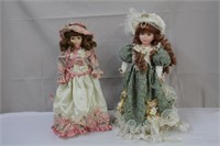Two porcelain dolls on stands including