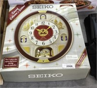 Seiko three-piece opens and turns, Melody clock