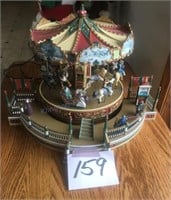 Electric Christmas carousel 17 inches wide by 11