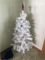 4 foot tall Christmas tree with ornaments and