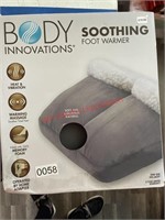 Grey Feet Massager and warmer New (dining room)