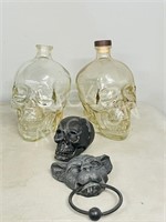 2 glass skull bottles,cast skull,gargoyle knocker