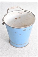 Metal bucket with wooden handle