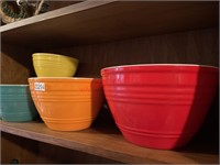 Four Colorful Nesting Bowls (back room)