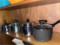 Pans on this shelf (back house)