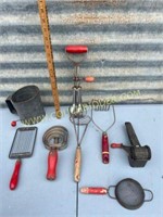 antique red wood handle kitchen utensils