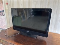 Philips TV (32", model: 32PFL3506-F7) with remote