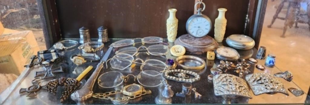 Shelf lot of misc vintage glasses watches & more