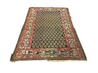 Antique hand knotted area rug