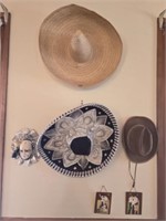 Estate lot of hats and wall decor