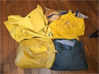 Estate lot of yellow rubber jackets and overalls