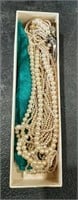 synthetic pearl strands, clip