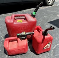 3 Gas Cans - Some are partially full
