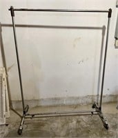 Clothing Rack in Basement - Dusty, Needs Cleaning