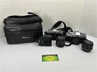 2 Minolta Cameras and Carrying Bag