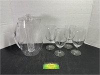Plastic Pitcher and 4 Wine Glasses