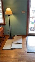 57’’ floor lamp with (3) 27x7’’ throw rugs off