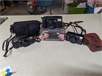 2 Nikon & 1 Minolta Film Cameras