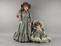 Two Matching Porcelain Doll & Baby