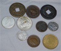 (10) Assorted Foreign Coins Includes 1944 Silver