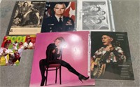 one vinyl Belinda album a signed poster by the