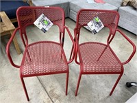 2 NEW STEEL RED PATIO CHAIRS.