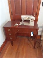 Singer Sewing Machine in Mahogany Cabinet