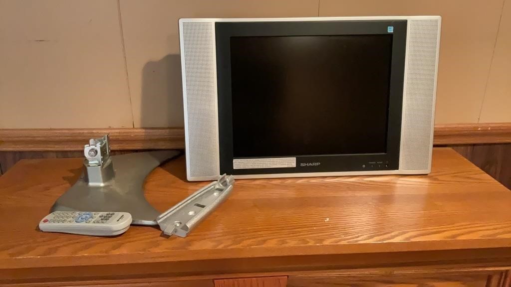 15’’ sharp tv with remote and swivel base