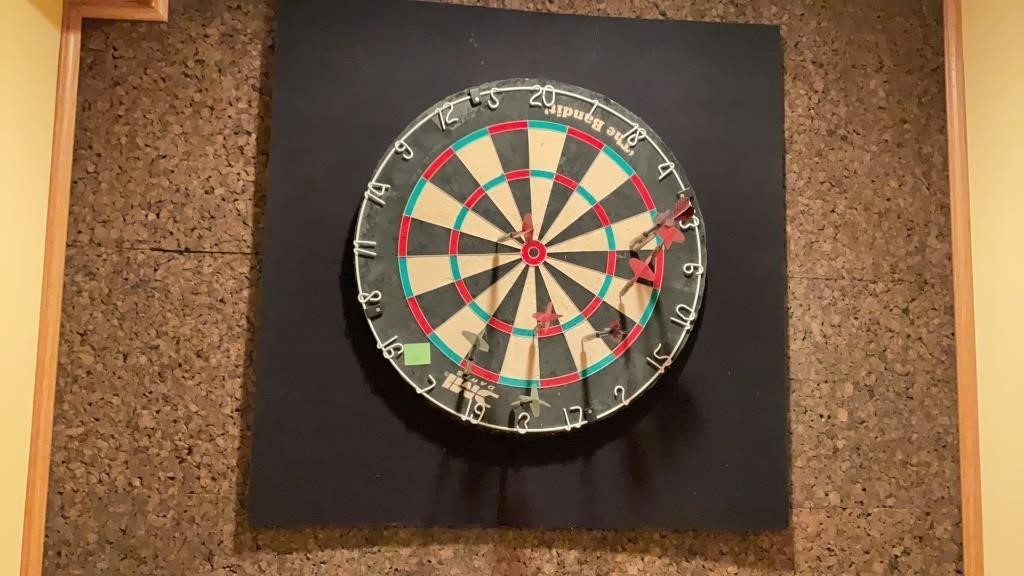 The bandit dart board with darts