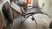 (2) folding patio chaise lounges