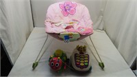 baby rocker and assorted toys