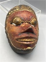Carved wood tribal mask