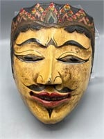 Carved wood dance tribal mask
