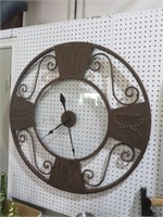 UNIQUE METAL WALL CLOCK WITH GLASS CENTER