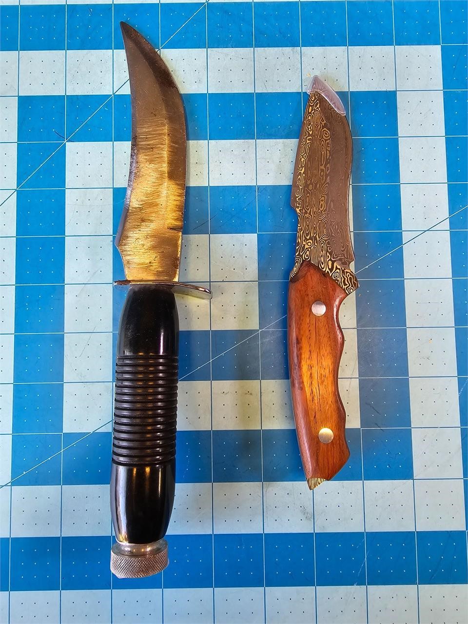 Hunting knives with leather sheaths