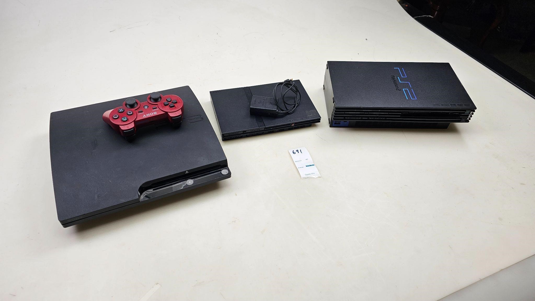 One ps3 & ps3 controller and two PlayStation 2s