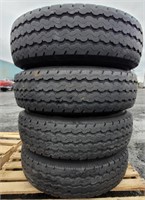 4 Trailer tires 12 ply 235/85R/16 on 8 lug spokes
