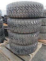 4 Goodyear Wrangler tires on 8 lug alum wheels