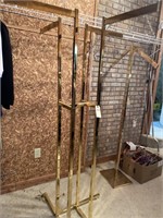Gold metal free standing clothes rack