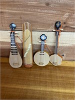 4CT OF MINIATURE WOODEN MUSICAL INSTRUMENTS