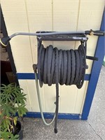 Hose reel  Bring your own tools and help to remove