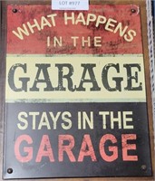 WHAT HAPPENS IN THE GARAGE SINGLE SIDED TIN SIGN