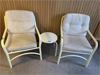 2  Metal framed chairs with cushions & plastic
