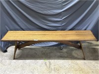 craftsman Oak bench with walnut band and an arched