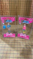 Worlds smallest, Barbies, rollerblade and cowgirl