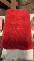 Red bath rug