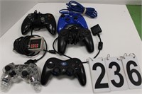 Box of Various Game Controllers