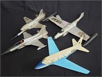 Group of vintage toy airplanes