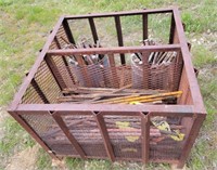 Assorted Concrete Stakes in Steel Cage