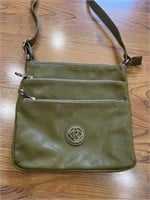 C10) Olive green purse. Has one flaw shown